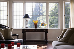 Domestic living room with large window Domestic living room with large window